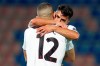 AC Milan's Brahim Diaz, right, celebrates with his teammate Ante Rebic after scoring his side's second goal, during the Serie A soccer match between Crotone and AC Milan, in Crotone, Italy, Sunday, Sept. 27, 2020. (Spada/LaPresse via AP)