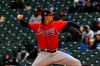 Atlanta Braves starting pitcher Kyle Wright delivers during the first iinning of a baseball game against the Chicago Cubs on Friday, April 16, 2021, in Chicago. (AP Photo/Matt Marton)