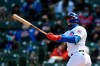 Chicago Cubs Javier Baez watches his three-run home run during the third inning of a baseball game against the Atlanta Braves Saturday, April 17, 2021, in Chicago. (AP Photo/Paul Beaty)