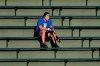 Chicago Cubs infielder Anthony Rizzo watches teammates during baseball practice at Wrigley Field in Chicago, Friday, July 10, 2020. (AP Photo/Nam Y. Huh)