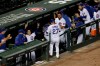 Chicago Cubs' Jason Kipnis (27) is congratulated by teammates after hitting a solo home run against the Pittsburgh Pirates during the fourth inning of a baseball game in Chicago, Friday, July 31, 2020. (AP Photo/Nam Y. Huh)