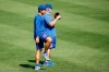 Chicago Cubs first baseman Anthony Rizzo, left, stands next to manager David Ross, right, during baseball practice at Wrigley Field, Sunday, July 5, 2020, in Chicago. (AP Photo/Kamil Krzaczynski)
