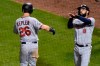 Minnesota Twins' Max Kepler (26) celebrates with Minnesota Twins' Marwin Gonzalez (9) after they score on Kepler's two-run home run during the seventh inning of a baseball game against the Chicago Cubs Sunday, Sept. 20, 2020, in Chicago. (AP Photo/Matt Marton)