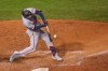 Minnesota Twins' Mitch Garver hits a two-run single against the Chicago Cubs during the seventh inning of a baseball game, Saturday, Sept. 19, 2020, in Chicago. (AP Photo/Kamil Krzaczynski)