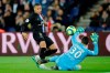 PSG's Kylian Mbappe, left,, scores a goal against Montpellier during the French League One soccer match between Paris-Saint-Germain and Montpellier at the Parc des Princes stadium in Paris, Saturday Feb. 1, 2020. (AP Photo/Christophe Ena)