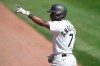 Chicago White Sox's Tim Anderson reacts after hitting a solo home run in the fourth inning of a baseball game against the Detroit Tigers Thursday, Aug. 20, 2020, in Chicago. (AP Photo/Jeff Haynes)