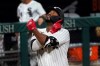 Chicago White Sox's Eloy Jimenez celebrates his three-run home run off Detroit Tigers relief pitcher Jose Cisnero during the sixth inning of a baseball game Friday, Sept. 11, 2020, in Chicago. (AP Photo/Charles Rex Arbogast)