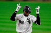 Chicago White Sox's Luis Robert celebrates while rounding the bases after hitting a two-run home run during the eighth inning of a baseball game against the Detroit Tigers Monday, Aug. 17, 2020, in Chicago. (AP Photo/Paul Beaty)