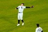 Chicago White Sox's Andrew Vaughn makes an awkward catch of a fly ball hit by Texas Rangers' Nate Lowe during the fifth inning of a baseball game Friday, April 23, 2021, in Chicago. (AP Photo/Charles Rex Arbogast)