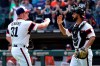 Chicago White Sox relief pitcher Liam Hendriks, left, celebrates with catcher Seby Zavala after they defeated the Houston Astros in a baseball game in Chicago, Sunday, July 18, 2021. (AP Photo/Nam Y. Huh)