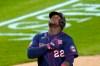 Minnesota Twins' Miguel Sano celebrates his two-run home run off Chicago White Sox relief pitcher Matt Foster during the eighth inning of a baseball game Wednesday, Sept. 16, 2020, in Chicago. Josh Donaldson scored on the homer. (AP Photo/Charles Rex Arbogast)