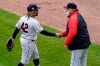 Cleveland Indians' Jose Ramirez, left, celebrates with manager Terry Francona after the Cleveland Indians defeated the Chicago White Sox 4-2 in a baseball game in Chicago, Thursday, April 15, 2021. (AP Photo/Nam Y. Huh)