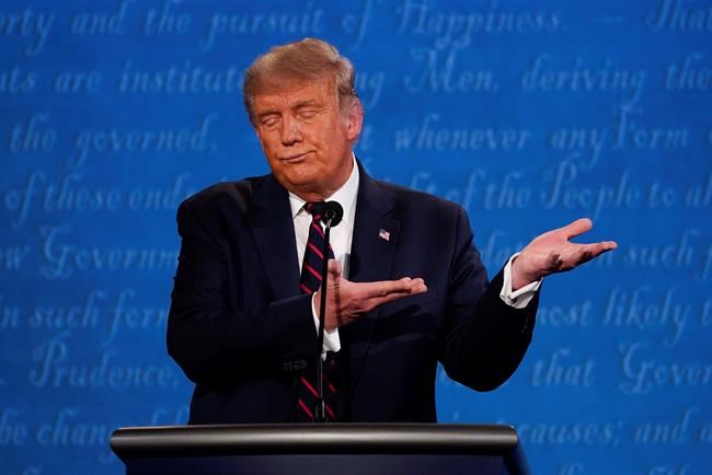 President Donald Trump gestures while speaking during the first presidential debate Tuesday, Sept. 29, 2020, at Case Western University and Cleveland Clinic, in Cleveland, Ohio. (AP Photo/Julio Cortez)