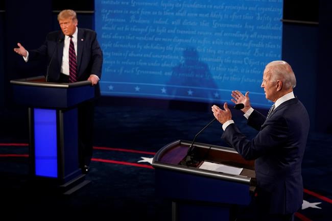 President Donald Trump and Democratic presidential candidate former Vice President Joe Biden exchange points during the first presidential debate Tuesday, Sept. 29, 2020, at Case Western University and Cleveland Clinic, in Cleveland, Ohio. (AP Photo/Morry Gash, Pool)