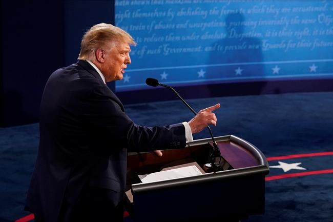President Donald Trump makes a point during the first presidential debate against Democratic presidential candidate former Vice President Joe Biden, Tuesday, Sept. 29, 2020, at Case Western University and Cleveland Clinic, in Cleveland, Ohio. (AP Photo/Morry Gash, Pool)