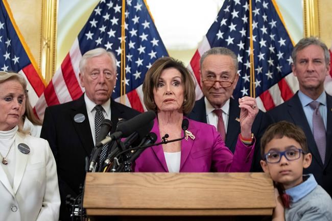 From left, Rep. Debbie Dingell, D-Mich., House Majority Leader Steny Hoyer of Md., House Speaker Nancy Pelosi of Calif., Senate Minority Leader Chuck Schumer of N.Y., and Rep. Matt Cartwright, D-Pa., attend a news conference on healthcare, on Capitol Hill, Tuesday, Feb. 4, 2020 in Washington. Democrats will call on President Donald Trump to drop his lawsuit and work with Democrats to lower prescription drug costs and expand healthcare coverage. (AP Photo/Alex Brandon)