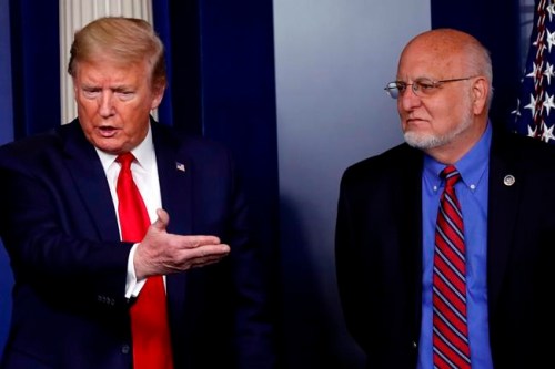 President Donald Trump speaks about the coronavirus in the James Brady Press Briefing Room of the White House, Wednesday, April 22, 2020, in Washington, as Dr. Robert Redfield, director of the Centers for Disease Control and Prevention, listens. (AP Photo/Alex Brandon)