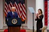Judge Amy Coney Barrett applauds as President Donald Trump announces Barrett as his nominee to the Supreme Court, in the Rose Garden at the White House, Saturday, Sept. 26, 2020, in Washington. (AP Photo/Alex Brandon)