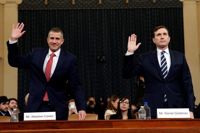 Republican staff attorney Steve Castor, left, and Democratic staff attorney Daniel Goldman and are sworn in to testify as the House Judiciary Committee hears investigative findings in the impeachment inquiry of President Donald Trump, Monday, Dec. 9, 2019, on Capitol Hill in Washington. (AP Photo/Alex Brandon)