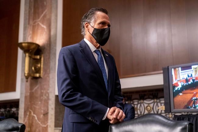 Sen. Mitt Romney, R-Utah, appears before the start of a Senate Homeland Security and Governmental Affairs & Senate Rules and Administration joint hearing on Capitol Hill, Washington, Tuesday, Feb. 23, 2021, to examine the January 6th attack on the Capitol. (AP Photo/Andrew Harnik, Pool)