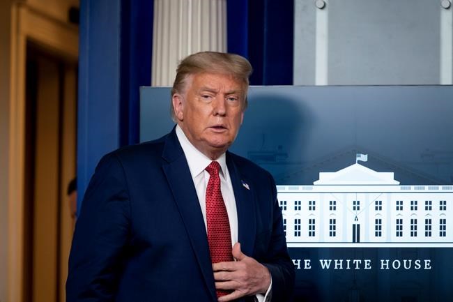 President Donald Trump arrives for a news conference in the James Brady Press Briefing Room at the White House, Monday, Aug. 10, 2020, in Washington. (AP Photo/Andrew Harnik)