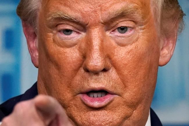 President Donald Trump speaks at a news conference in the James Brady Press Briefing Room at the White House, Thursday, Aug. 13, 2020, in Washington. (AP Photo/Andrew Harnik)