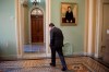 Sen. Joe Manchin, D-W.Va., walks away from the Senate chamber at the Capitol in Washington, Tuesday, Jan. 21, 2020. President Donald Trump’s impeachment trial quickly burst into a partisan fight Tuesday as proceedings began unfolding at the Capitol. (AP Photo/Cliff Owen)