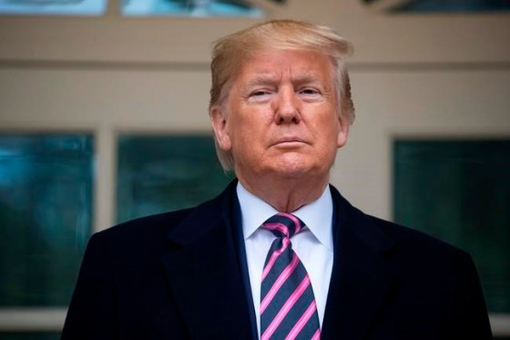 President Donald Trump poses for photos as he meets with Paraguay's President Mario Abdo Benitez at the White House, Friday, Dec. 13, 2019, in Washington. (AP Photo/ Evan Vucci)