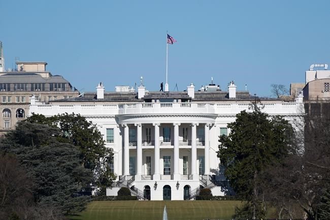 An American flag flies above the White House in Washington, Saturday, Jan. 9, 2021. (AP Photo/Patrick Semansky)