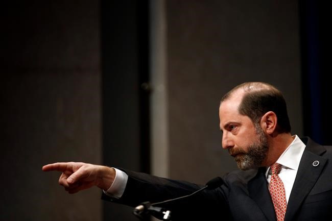 Health and Human Services Secretary Alex Azar takes a reporter's question as he speaks at a news conference about the federal government's response to a virus outbreak originating in China, Tuesday, Jan. 28, 2020, in Washington. (AP Photo/Patrick Semansky)
