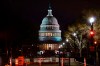 The Capitol is seen behind reinforced barricades as the second impeachment trial of former President Donald Trump begins in the Senate in Washington, Tuesday, Feb. 9, 2021. Trump was charged by the House with incitement of insurrection for his role in agitating a violent mob of his supporters that laid siege to the U.S. Capitol on Jan. 6, and sent members of Congress into hiding as they met to validate President Joe Biden's victory. (AP Photo/J. Scott Applewhite)