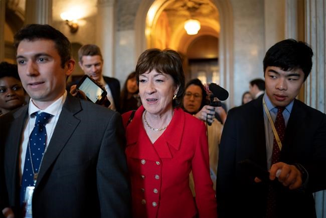 Sen. Susan Collins, R-Maine, center, departs as Republican senators leave a closed-door strategy session at the Capitol in Washington, Tuesday, Feb. 4, 2020. They are expected to acquit President Donald Trump tomorrow on impeachment charges of abuse of power and obstruction of Congress. (AP Photo/J. Scott Applewhite)