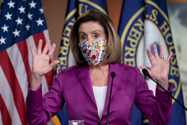 Speaker of the House Nancy Pelosi, D-Calif., holds a news conference on the day after violent protesters loyal to President Donald Trump stormed the U.S. Congress, at the Capitol in Washington, Thursday, Jan. 7, 2021. (AP Photo/J. Scott Applewhite)