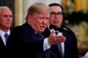 President Donald Trump, gestures as he and Chinese Vice Premier Liu He prepare to sign a U.S. China trade agreement, in the East Room of the White House, Wednesday, Jan. 15, 2020, in Washington. (AP Photo/Steve Helber)