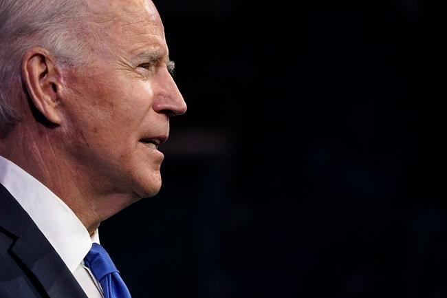 President-elect Joe Biden speaks after the Electoral College formally elected him as president, Monday, Dec. 14, 2020, at The Queen theater in Wilmington, Del. (AP Photo/Patrick Semansky)