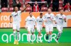 Felix Uduokhai of Augsburg, left, cheers for his goal during the German Bundesliga soccer match between FC Augsburg and Borussia Dortmund in Augsburg, Germany, Saturday, Sept. 26, 2020. (Matthias Balk/dpa via AP)