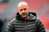 FILE - In this Sunday, March 14, 2021 file photo, Leverkusen coach Peter Bosz walks in the stadium before the Bundesliga soccer match between Bayer Leverkusen and Arminia Bielefeld in Leverkusen, Germany. Bayer Leverkusen has fired Peter Bosz as coach after the team's decline in form this year. (Ina Fassbender/Pool via AP, file)