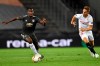 Manchester's Paul Pogba, left, and Sevilla's Luuk de Jong challenge for the ball during the UEFA Europa League semifinal match between FC Sevilla and Manchester United in Cologne, Germany, Sunday, Aug. 16, 2020. (Marius Becker/dpa via AP)
