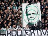Supporters of Moenchengladbach show a banner with the portrait of Dietmar Hopp during the German Bundesliga soccer match between Borussia Moenchengladbach and TSG Hoffenheim in Moenchengladbach, Germany, Saturday, Feb. 24, 2020. Borussia Mönchengladbach supporters were the center of attention for targeting Hoffenheim’s billionaire backer Dietmar Hopp with crude abusive messages during their sides’ Bundesliga game on Saturday. It led to a suspension in play, but their actions were quickly condemned by fellow fans before the game could be called off. ( Roland Weihrauch/dpa via AP)