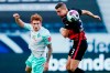 Bremen's Josh Sargent, left, and Frankfurt's Stefan Ilsanker fight for the ball during the German Bundesliga soccer match between Eintracht Frankfurt and Werder Bremen in Frankfurt, Germany, Saturday, Oct. 31, 2020. (Uwe Anspach//dpa via AP)