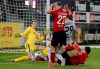 Leverkusen's Kai Havertz, center right, scores the opening goal during the German Bundesliga soccer match between SC Freiburg and Bayer 04 Leverkusen in Freiburg, Germany, Friday, May 29, 2020. Because of the coronavirus outbreak all soccer matches of the German Bundesliga take place without spectators. (Ronald Wittek/Pool via AP)