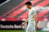 Munich's Robert Lewandowski walks on the pitch during the German Bundesliga soccer match between Eintracht Frankfurt and Bayern Munich in Frankfurt, Germany, Saturday, Feb. 20, 2021. (Arne Dedert/POOL via AP)