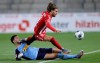 Moenchengladbach's Ramy Bensebaini, left, and Freiburg's Lucas Hoeler, right, battles for the ball during the German Bundesliga soccer match between SC Freiburg and Borussia Moenchengladbach in Freiburg, Germany, Friday, June 5, 2020. Because of the coronavirus outbreak all soccer matches of the German Bundesliga take place without spectators. (Ronald Wittek/Pool via AP)