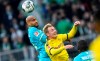 FILE - In this Saturday Nov. 2, 2019, file photo Dortmund's Julian Brandt, right, and Wolfsburg's John Brooks from the US, challenge for the ball during the German Bundesliga soccer match between Borussia Dortmund and VfL Wolfsburg in Dortmund, Germany. Wolfsburg is benefitting from American input after making a club-record 10-game unbeaten start to the Bundesliga. (AP Photo/Martin Meissner, file)