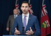 Ontario Education Minister Stephen Lecce answers questions at the daily briefing at Queen's Park in Toronto on Wednesday April 29, 2020. Ontario's education minister is set to give an update today on the status of schools and child care services as some businesses in the province begin to open their doors. THE CANADIAN PRESS/Frank Gunn