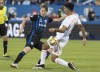 Montreal Impact's Lassi Lappalainen, left, challenges Atlanta United's Miles Robinson during second half MLS soccer action in Montreal, Sunday, September 29, 2019. The Montreal Impact has extended its loan agreement with Italy's Bologna FC 1909 for winger Lassi Lappalainen, keeping the Finnish international through the end of the year. THE CANADIAN PRESS/Graham Hughes