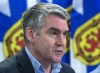 Premier Stephen McNeil addresses a news conference in Halifax on Sunday, March 15, 2020. Nova Scotia has identified two new cases of COVID-19, bringing the total confirmed cases to 1,048 to date. THE CANADIAN PRESS/Andrew Vaughan