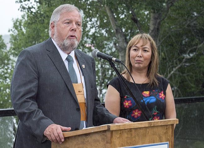 Robert Bertrand, national chief of the Congress of Aboriginal Peoples, addresses a news conference along with Francyne Joe, right, president of the Native Women's Association of Canada, at a meeting of Canadian premiers and Indigenous leaders at Le Pays de la Sagouine, a recreated historic Acadian village, in Bouctouche, N.B. on Wednesday, July 18, 2018. The Congress of Aboriginal Peoples has filed an application in the Federal Court of Canada, challenging the funding allocation of $250,000 it received as part of a COVID-19 fund earmarked for off-reserve Indigenous peoples. THE CANADIAN PRESS/Andrew Vaughan