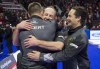 Team Koe second Brent Laing, centre, celebrates with lead Ben Hebert, left, and alternate Scott Pfeifer following their win over Team McEwen during the men's final at the 2017 Roar of the Rings Olympic Curling Trials in Ottawa on Sunday, December 10, 2017. Curling Canada has announced new head coaches for its mixed doubles and wheelchair curling teams. The organization said in a release Tuesday that Scott Pfeifer will take over the mixed curling program, while Mick Lizmore will head the wheelchair team. THE CANADIAN PRESS/Adrian Wyld