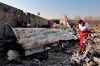 In this Wednesday, Jan. 8, 2020 photo, rescue workers search the scene where a Ukrainian plane crashed in Shahedshahr, southwest of the capital Tehran, Iran. THE CANADIAN PRESS/AP-Ebrahim Noroozi